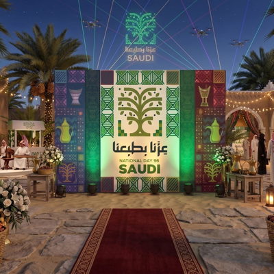 Step-and-repeat media wall event backdrop with sponsor logos in Riyadh — Admark Prints Fabric stage backdrop for a conference