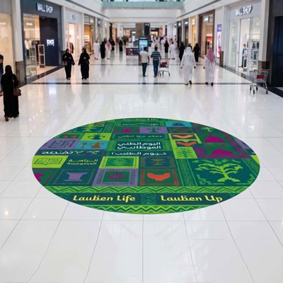 Anti-slip floor sticker with directional arrow in a retail store — Admark, Saudi Arabia Custom printed promotional floor grap
