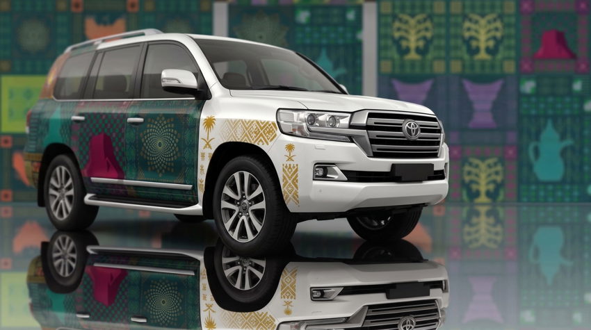 Saudi National Day 96 vehicle wrap with flag and emblem on a car in Riyadh — Admark Prints National Day fleet vehicle wrap in