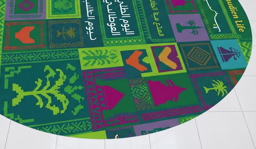 Anti-slip floor sticker with directional arrow in a retail store — Admark, Saudi Arabia Custom printed promotional floor grap