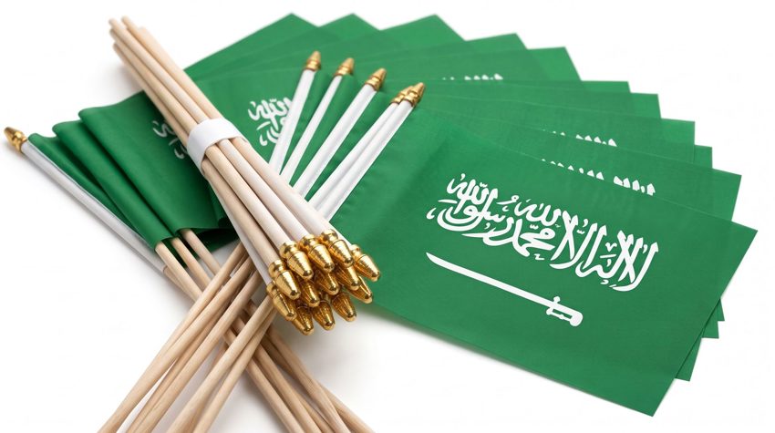 Mini desk flag with stand for offices and events in Riyadh